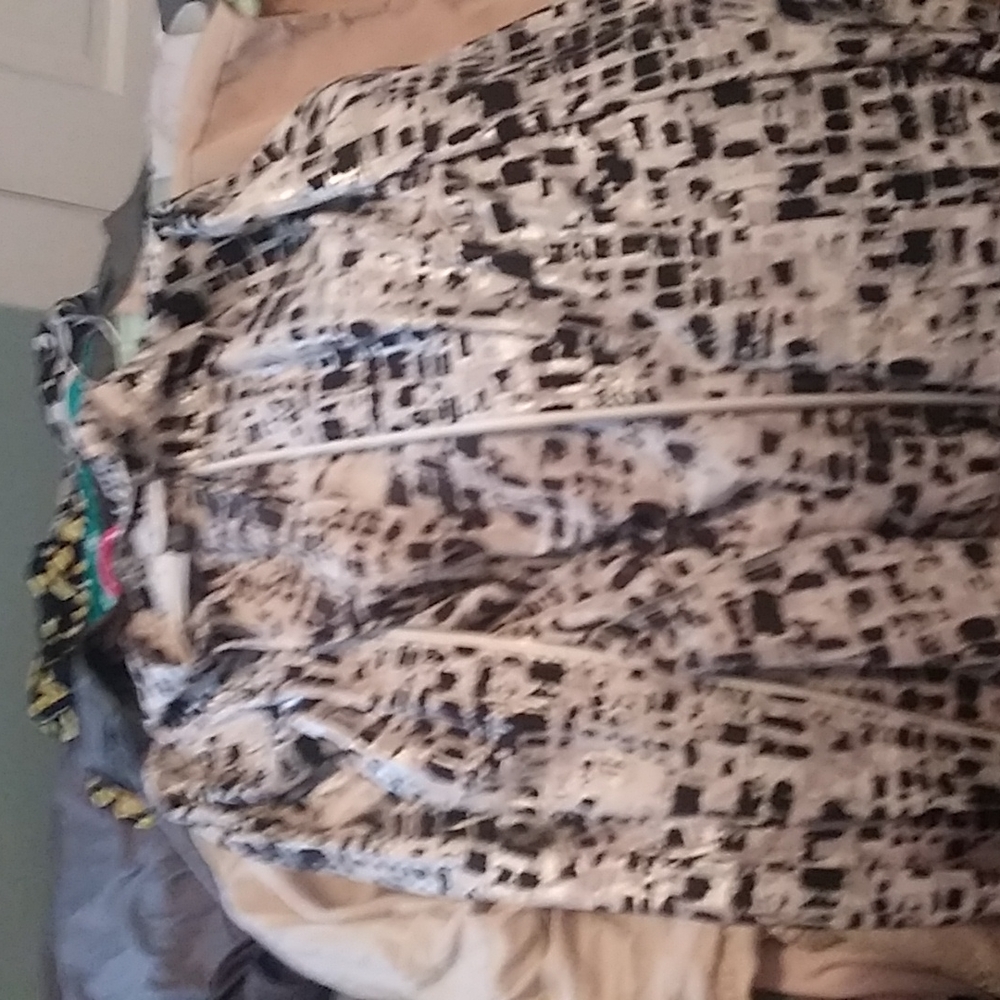 Jacket black and tan kind of silky